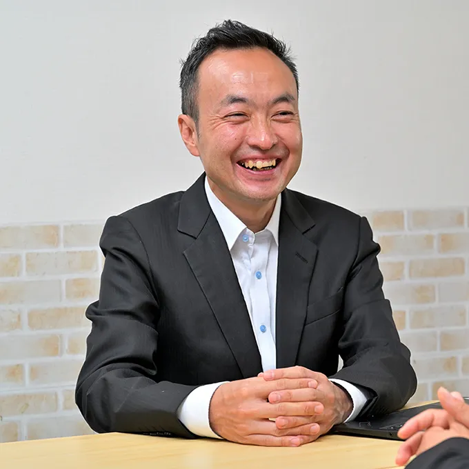 代表 富岡 功